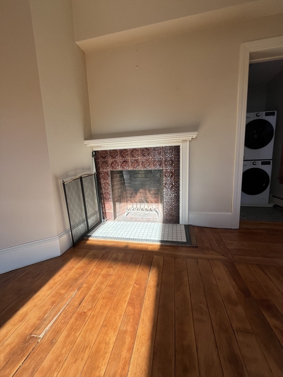 11 Revere Street, Unit 6 Boston, MA 02130 - Photo 24 of 32 a view of empty room with wooden floor