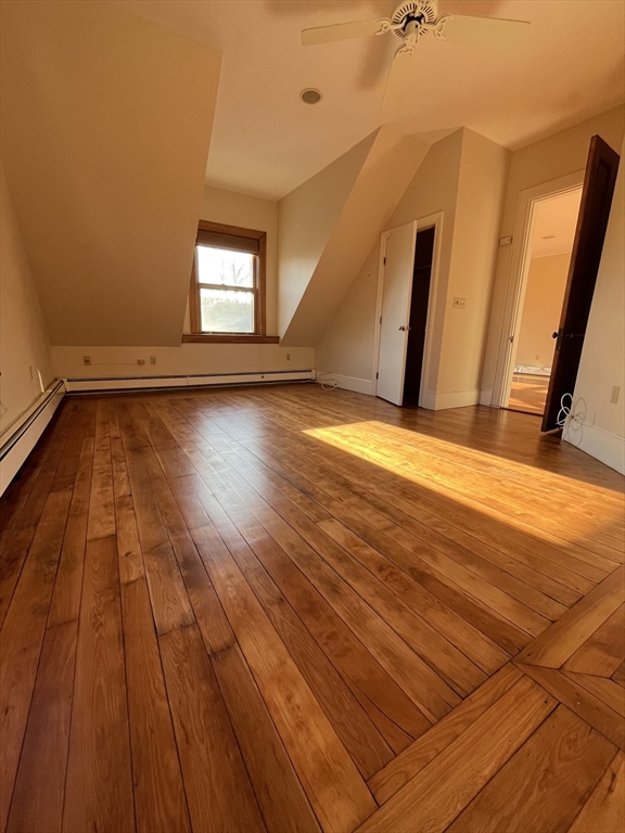 11 Revere Street, Unit 6 Boston, MA 02130 - Photo 25 of 32 a view of a room with wooden floor and window
