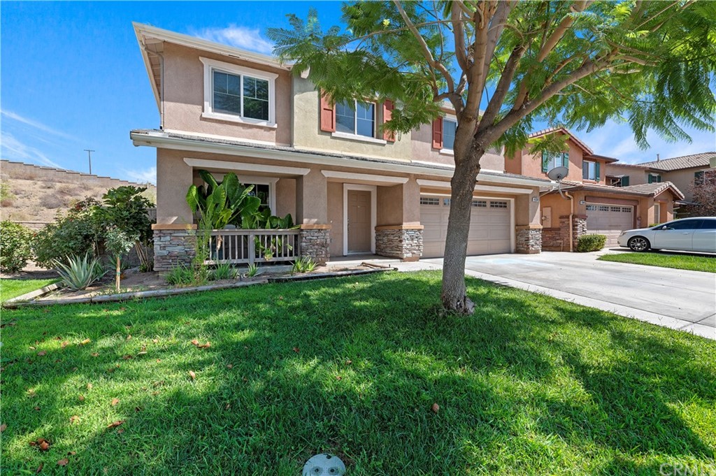 45038 Promise Road Lake Elsinore, CA 92532 - Photo 1 of 1 a front view of a house with a garden and yard