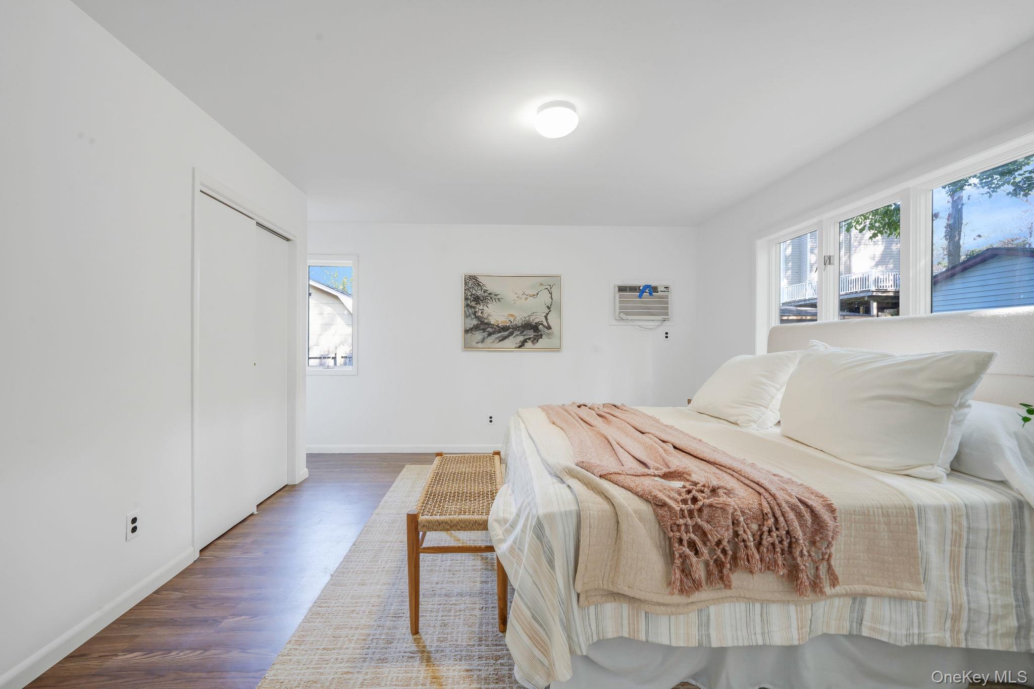 60 Hawthorne Road Rocky Point, NY 11778 - Photo 11 of 23 Bedroom with wood finished floors and a closet