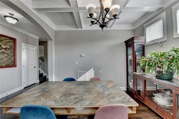 a kitchen with granite countertop lots of counter top space and stainless steel appliances