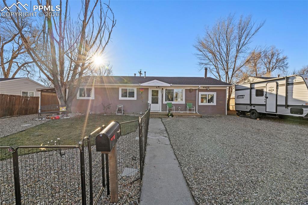 26 Easy Street Colorado Springs, CO 80911 - Photo 1 of 19 a view of a yard in front of house
