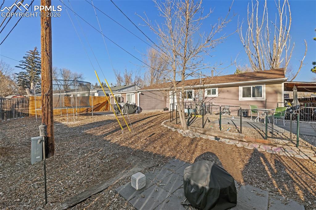 26 Easy Street Colorado Springs, CO 80911 - Photo 16 of 19 a view of a house with backyard