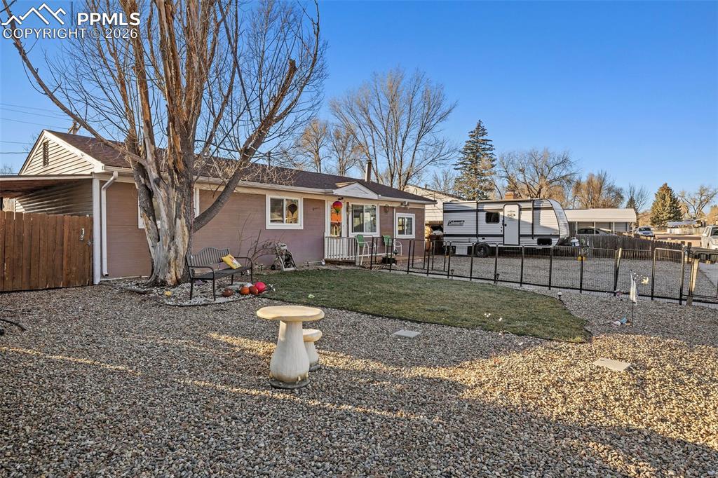 26 Easy Street Colorado Springs, CO 80911 - Photo 3 of 19 a view of a house with a yard