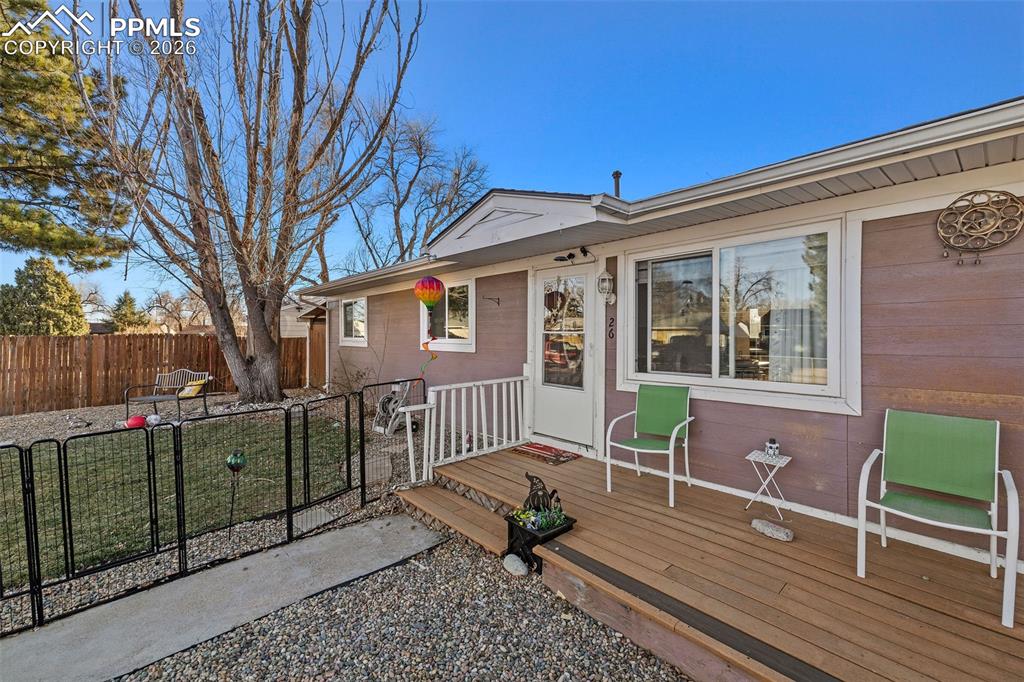26 Easy Street Colorado Springs, CO 80911 - Photo 4 of 19 a view of a house with backyard and sitting area