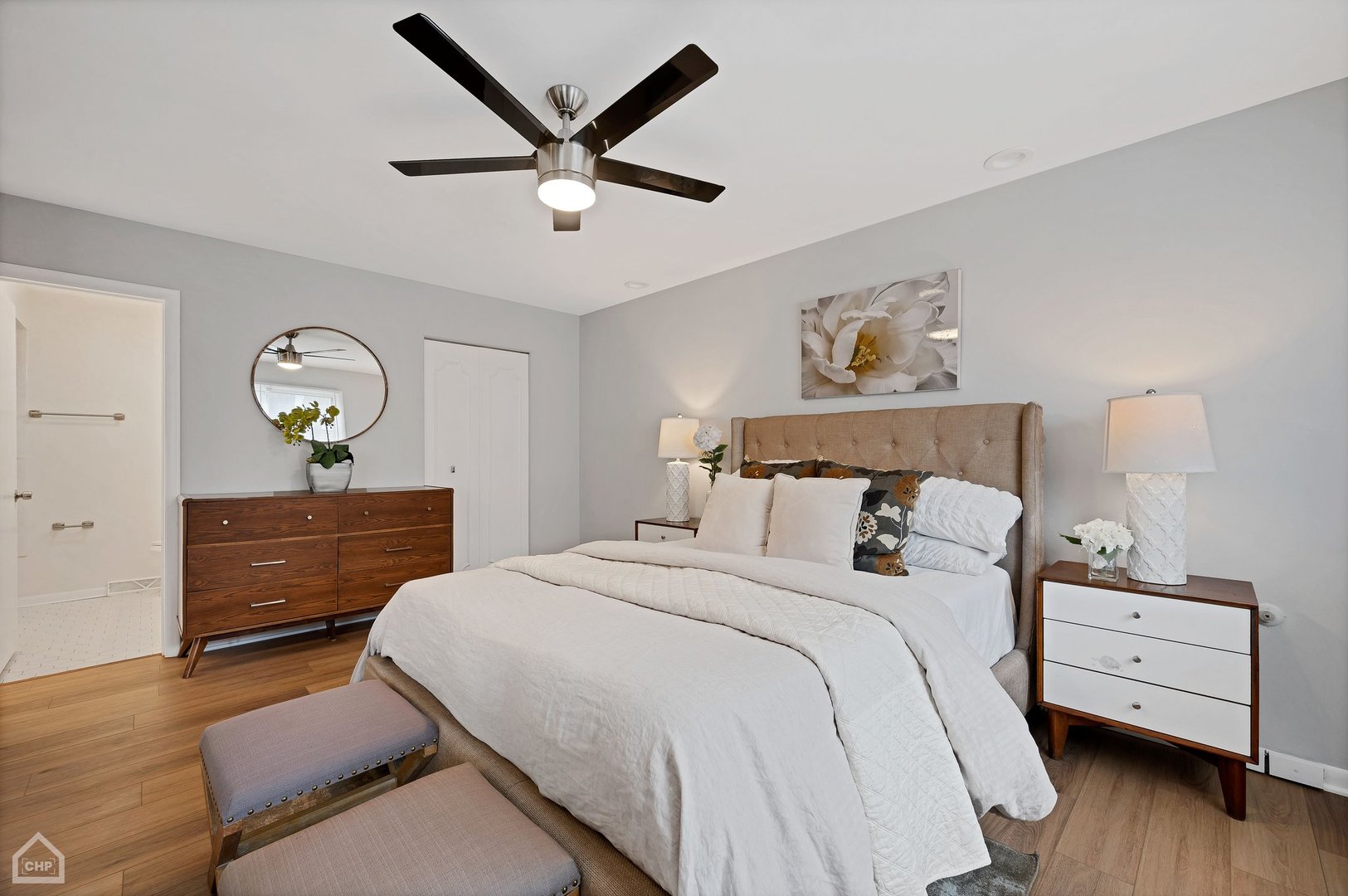 18812 Castle Road Homewood, IL 60430 - Photo 20 of 35 a bedroom with a bed and wooden floor
