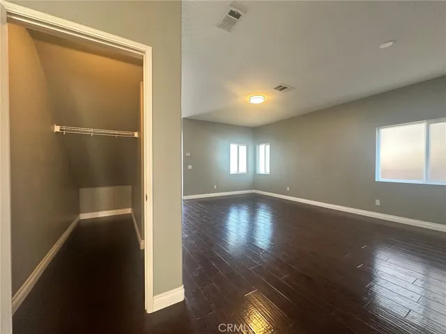 a view of livingroom with hardwood floor and window