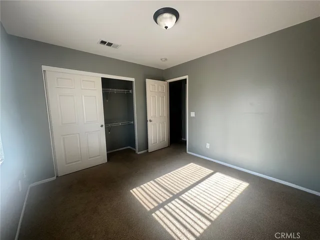 an empty room with an entryway