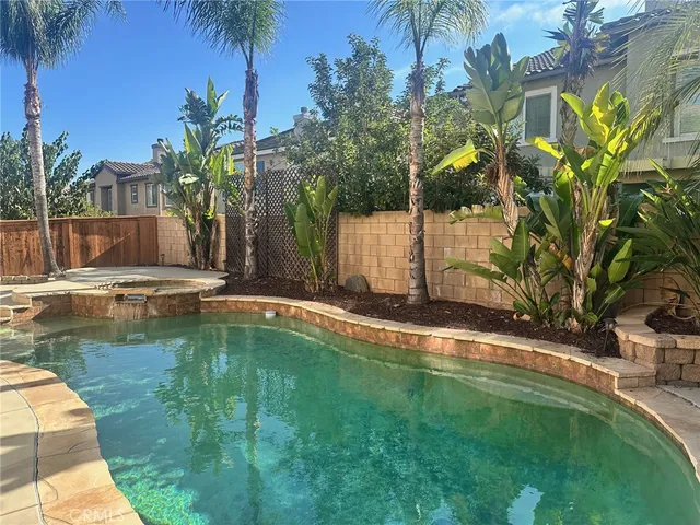 a view of swimming pool with a garden