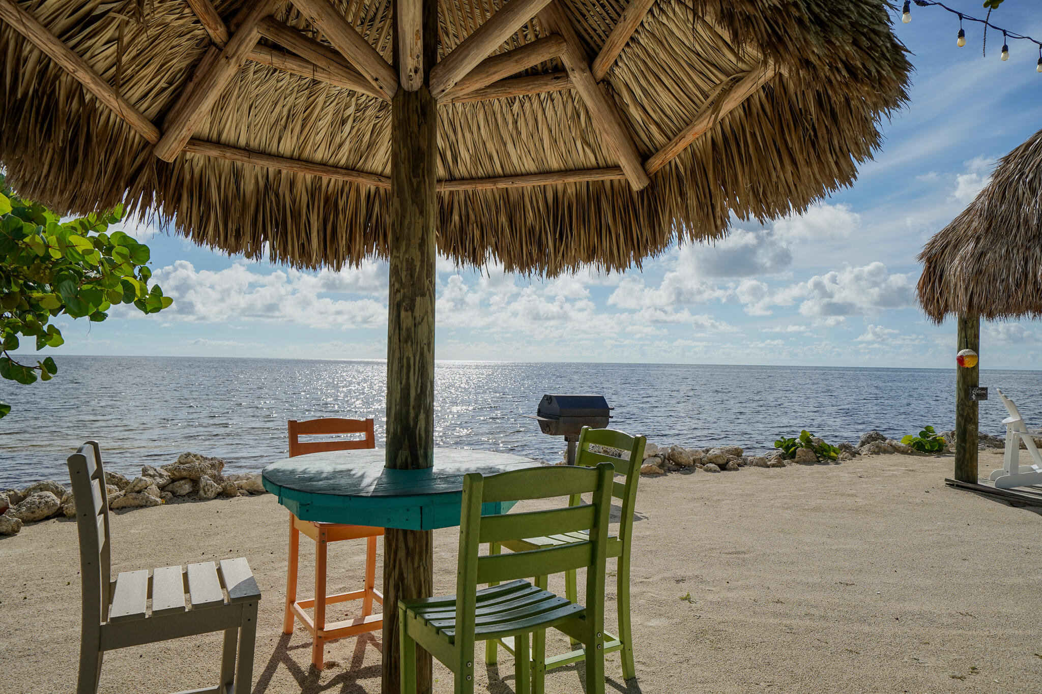 1500 Ocean Bay Drive, Unit H5 Key Largo, FL 33037 - Photo 24 of 24 a view of table and chairs with wooden floor