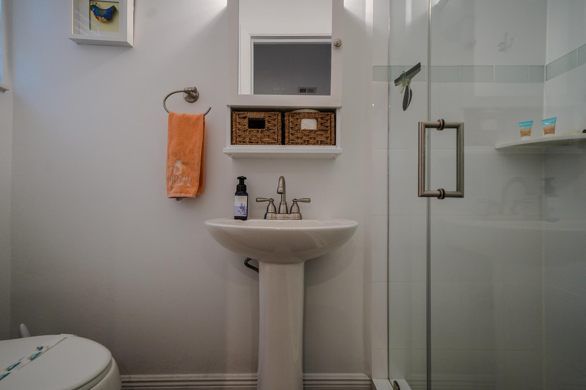 1500 Ocean Bay Drive, Unit H5 Key Largo, FL 33037 - Photo 9 of 24 a bathroom with a sink toilet and mirror