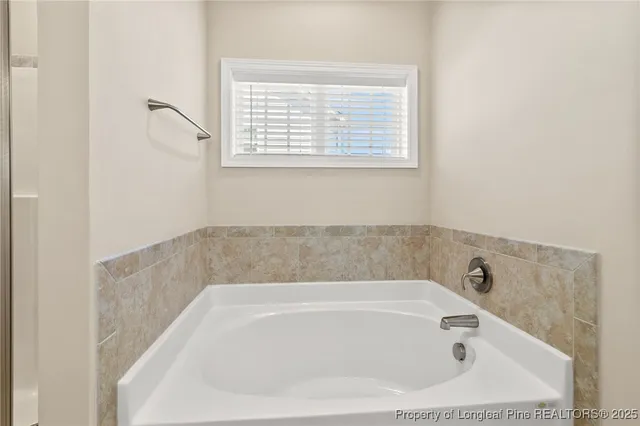a bathroom with a bathtub