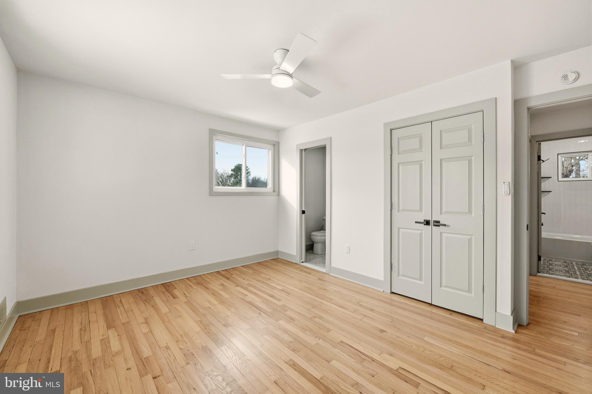 5717 Colon Terrace Temple Hills, MD 20748 - Photo 17 of 32 a view of an empty room with wooden floor
