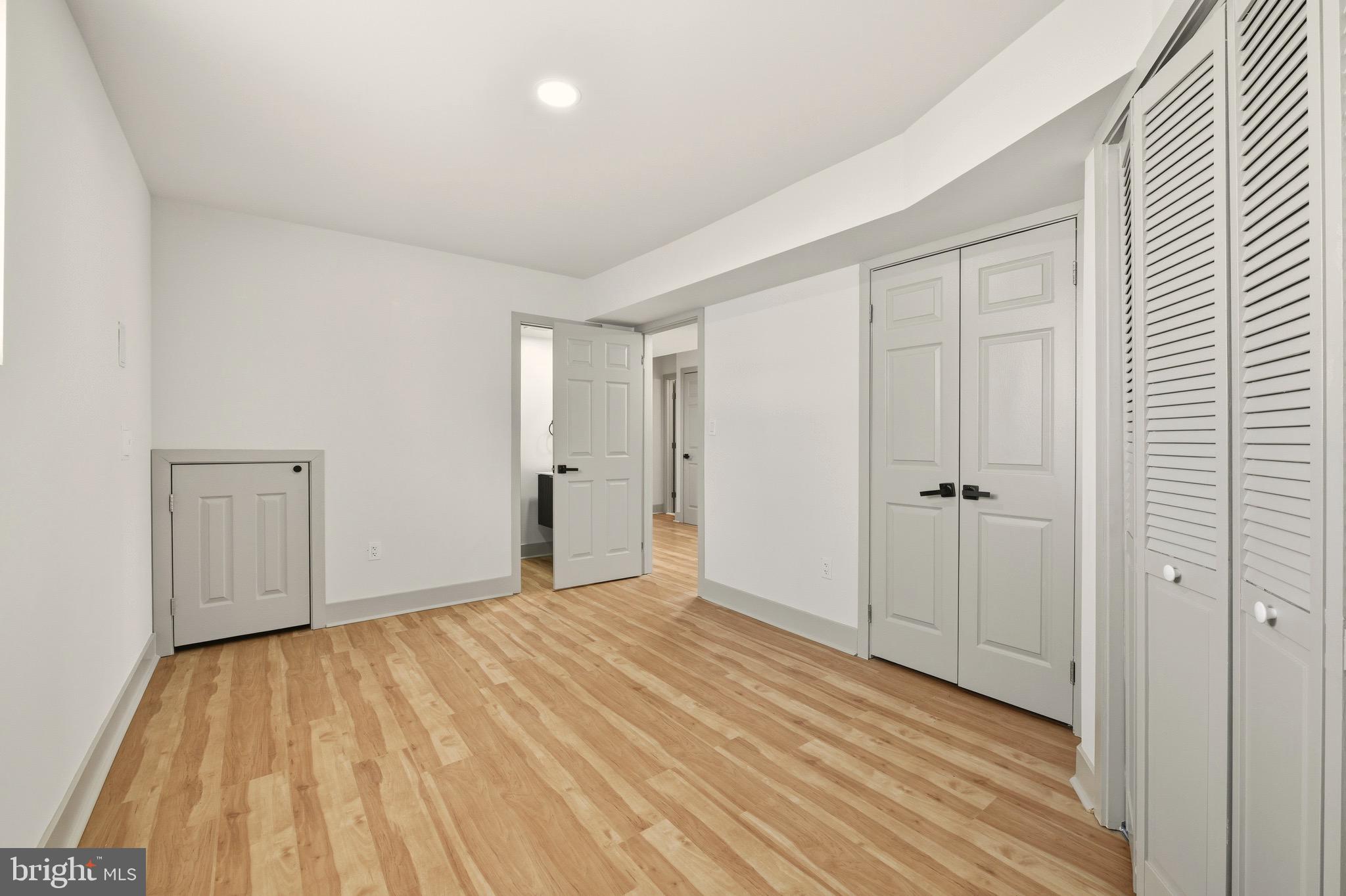 5717 Colon Terrace Temple Hills, MD 20748 - Photo 25 of 32 a view of empty room with wooden floor