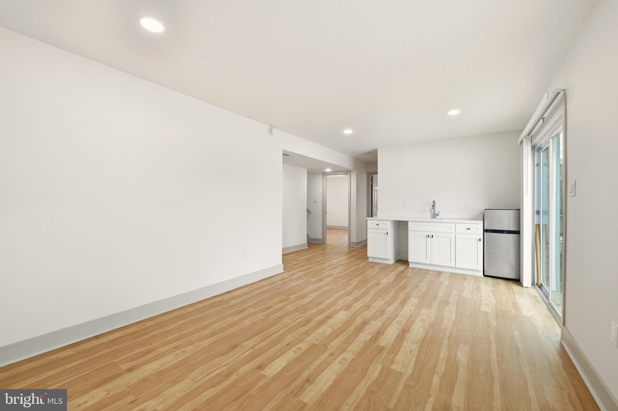 5717 Colon Terrace Temple Hills, MD 20748 - Photo 30 of 32 a view of a kitchen with wooden floor