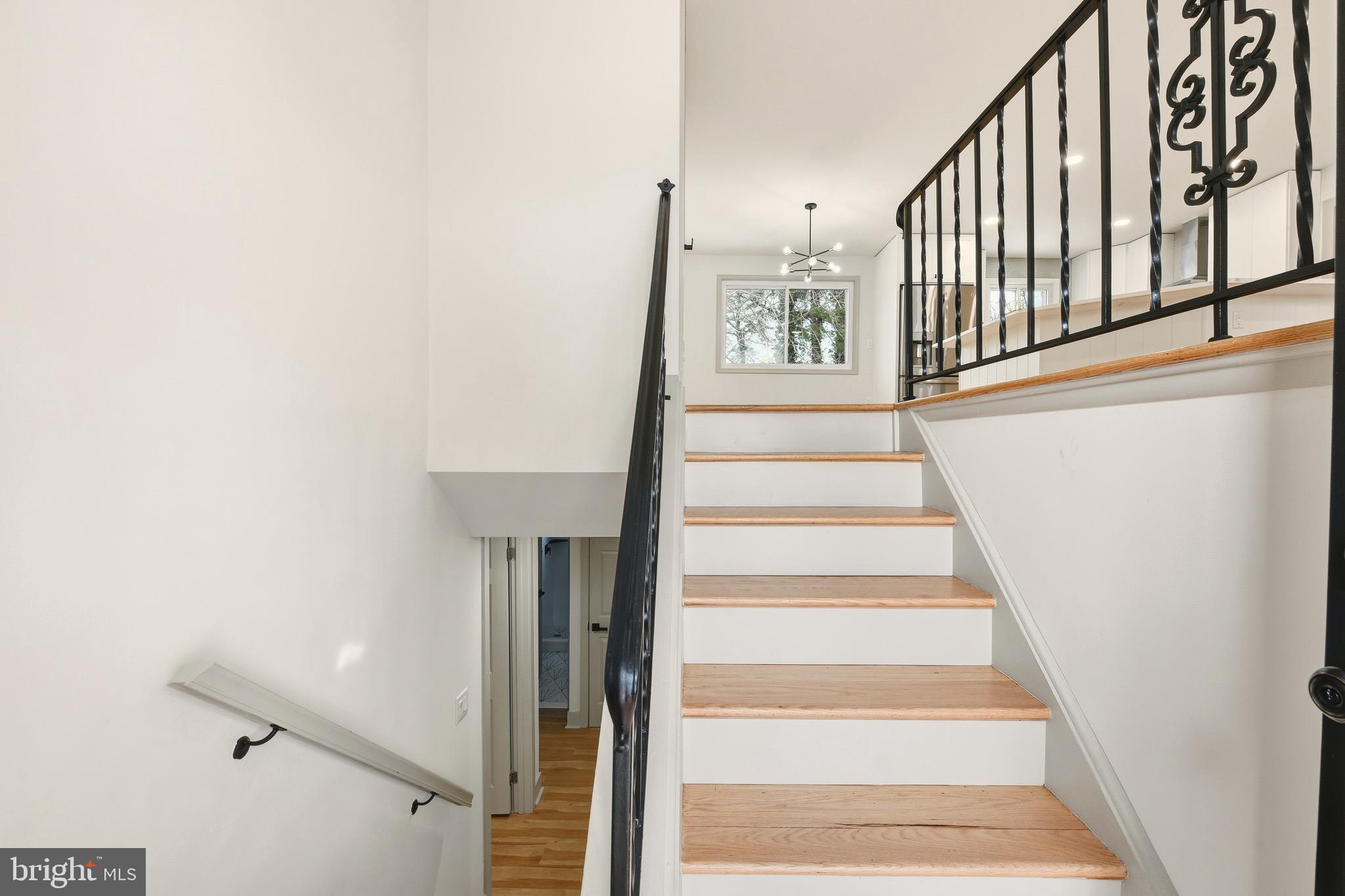 5717 Colon Terrace Temple Hills, MD 20748 - Photo 3 of 32 a view of staircase with white walls and a window