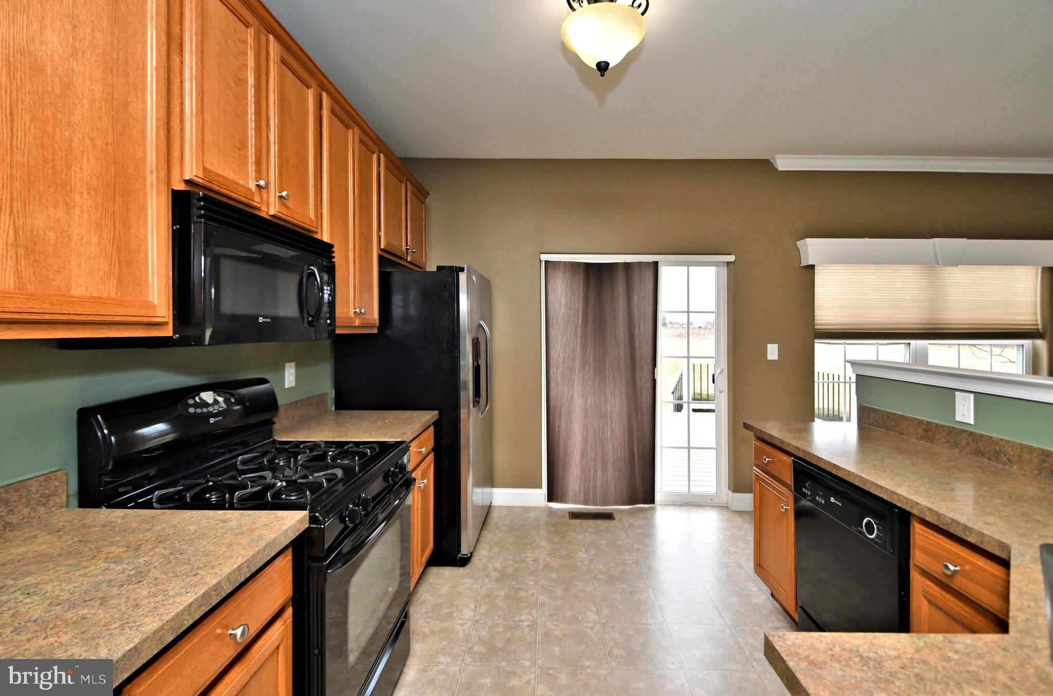 458 Buchanan Road Perkasie, PA 18944 - Photo 15 of 71 Kitchen with Sliding Door to Brand New Rear Deck