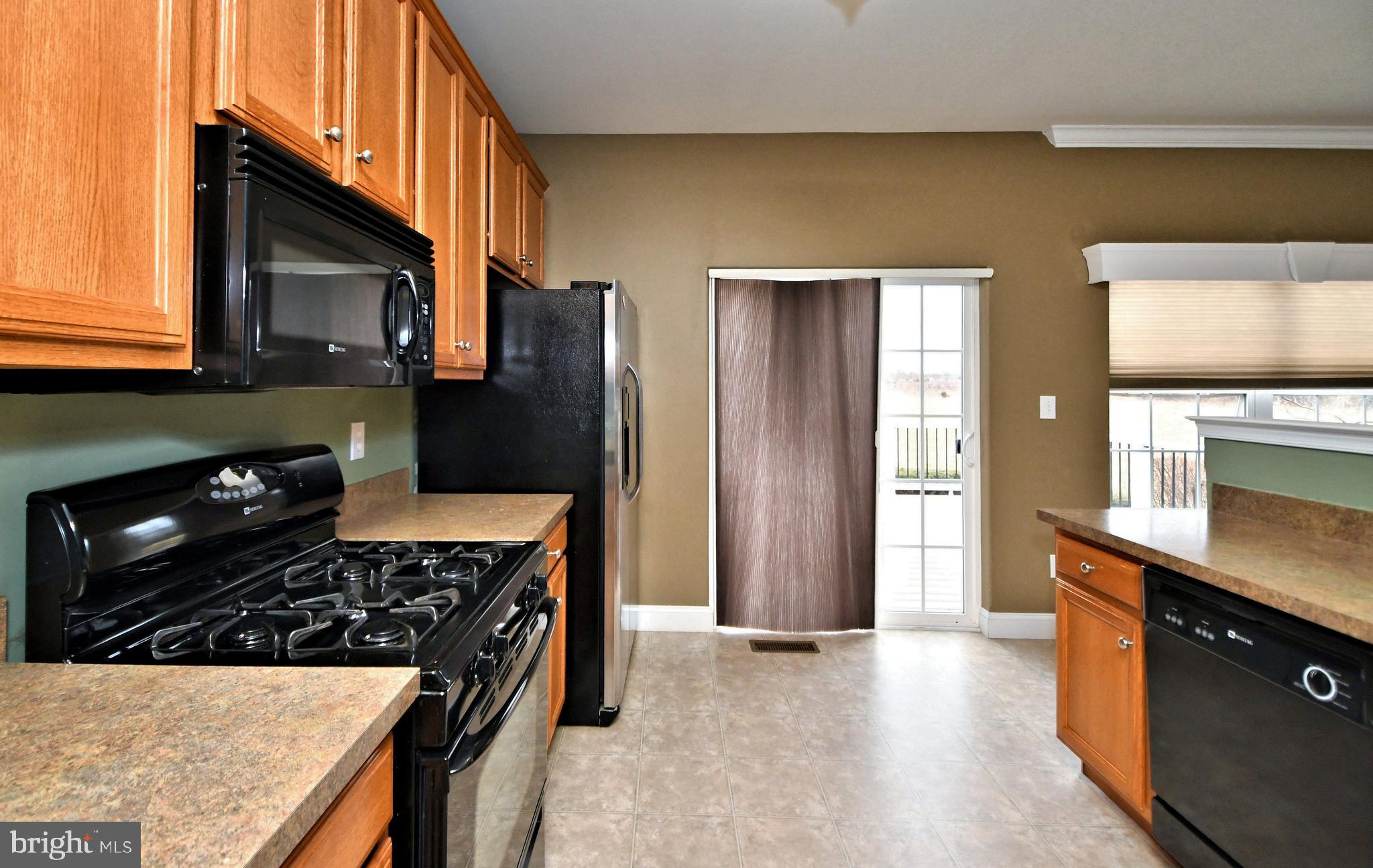 458 Buchanan Road Perkasie, PA 18944 - Photo 21 of 71 Kitchen & Sliding Door to Rear Deck