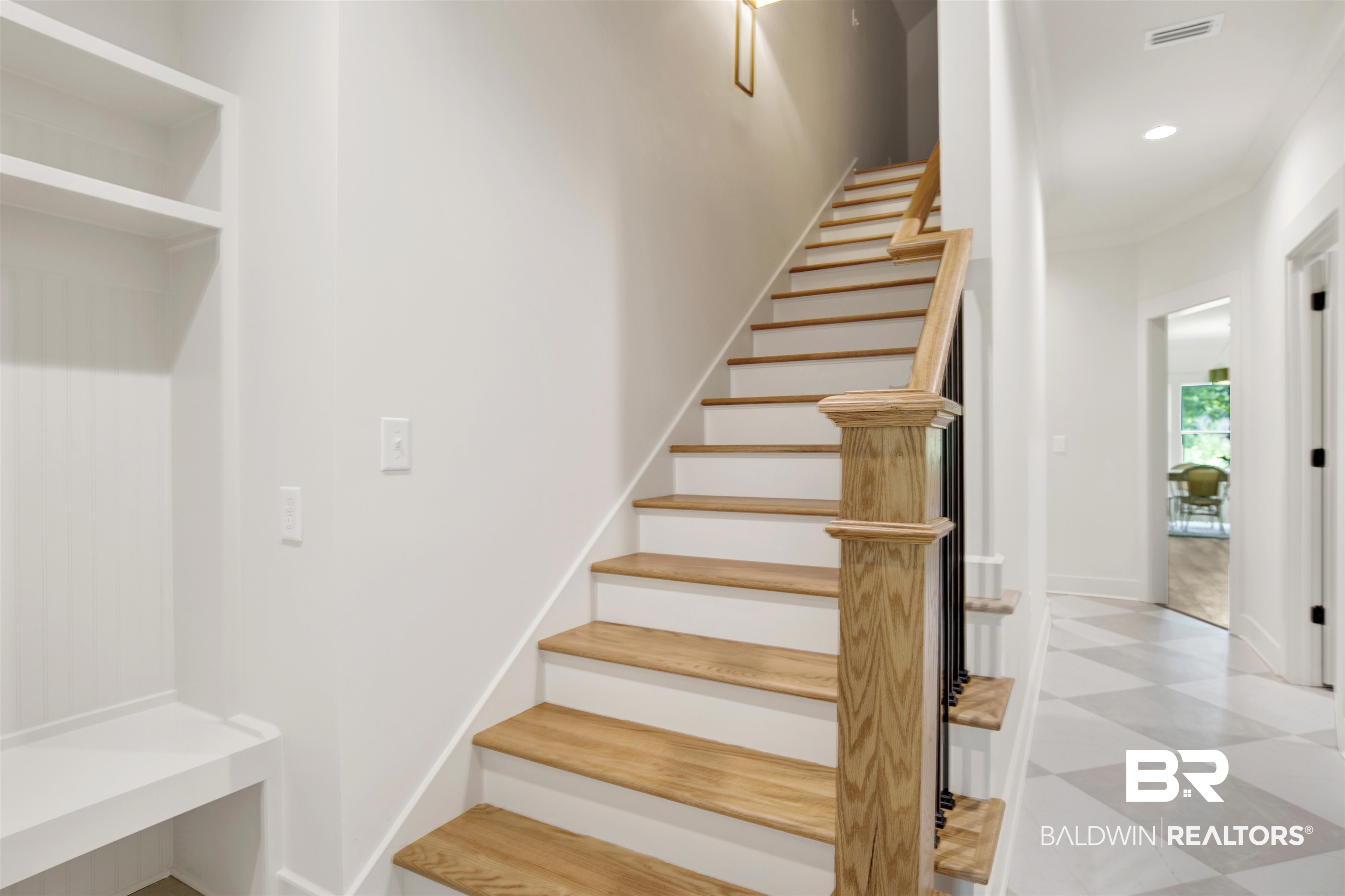 9275 Clarke Ridge Road Foley, AL 36535 - Photo 30 of 43 Stairway with tile patterned floors, recessed lighting, and baseboards