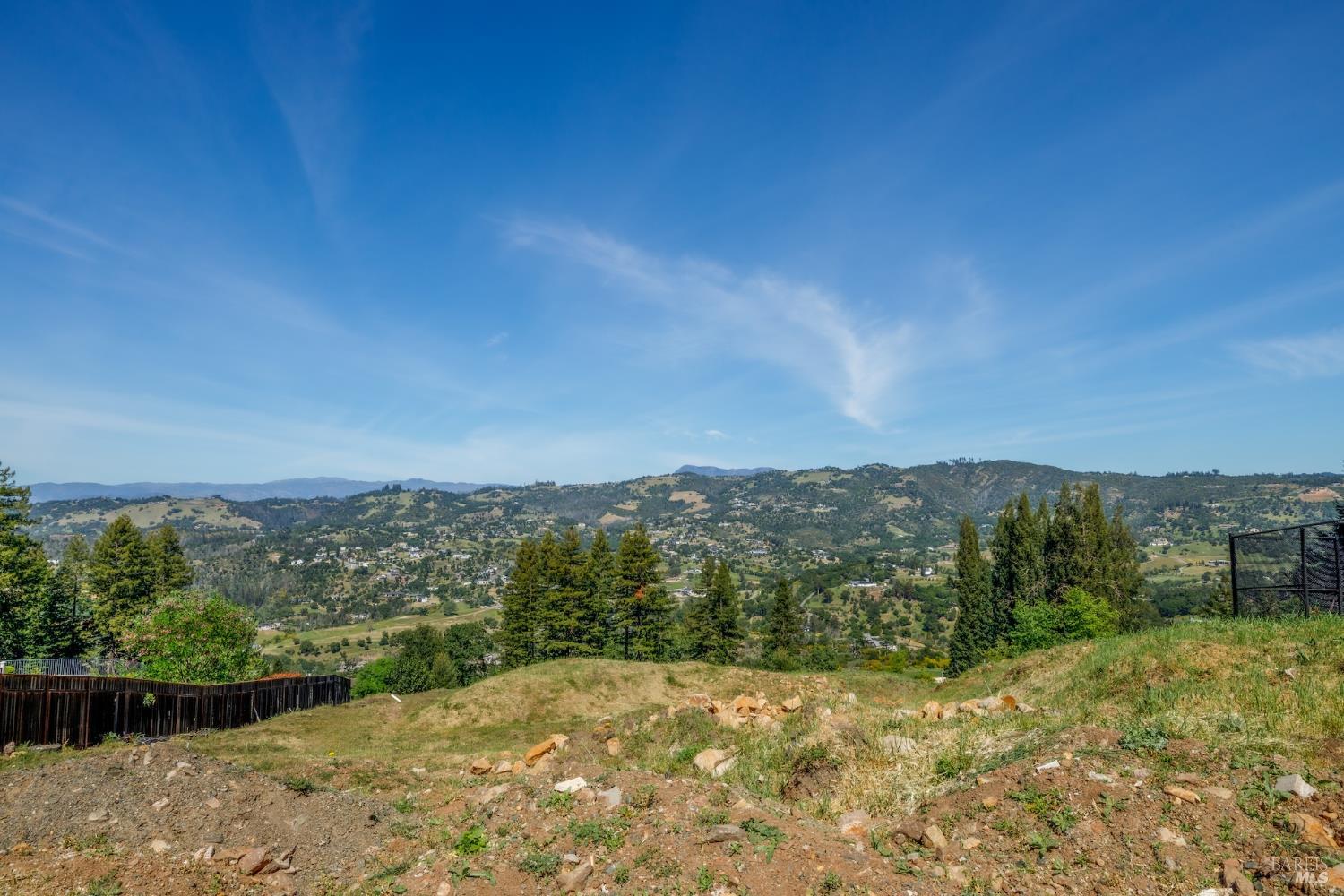 3888 Skyfarm Drive Santa Rosa, CA 95403 - Photo 11 of 18 a view of a city with lush green forest