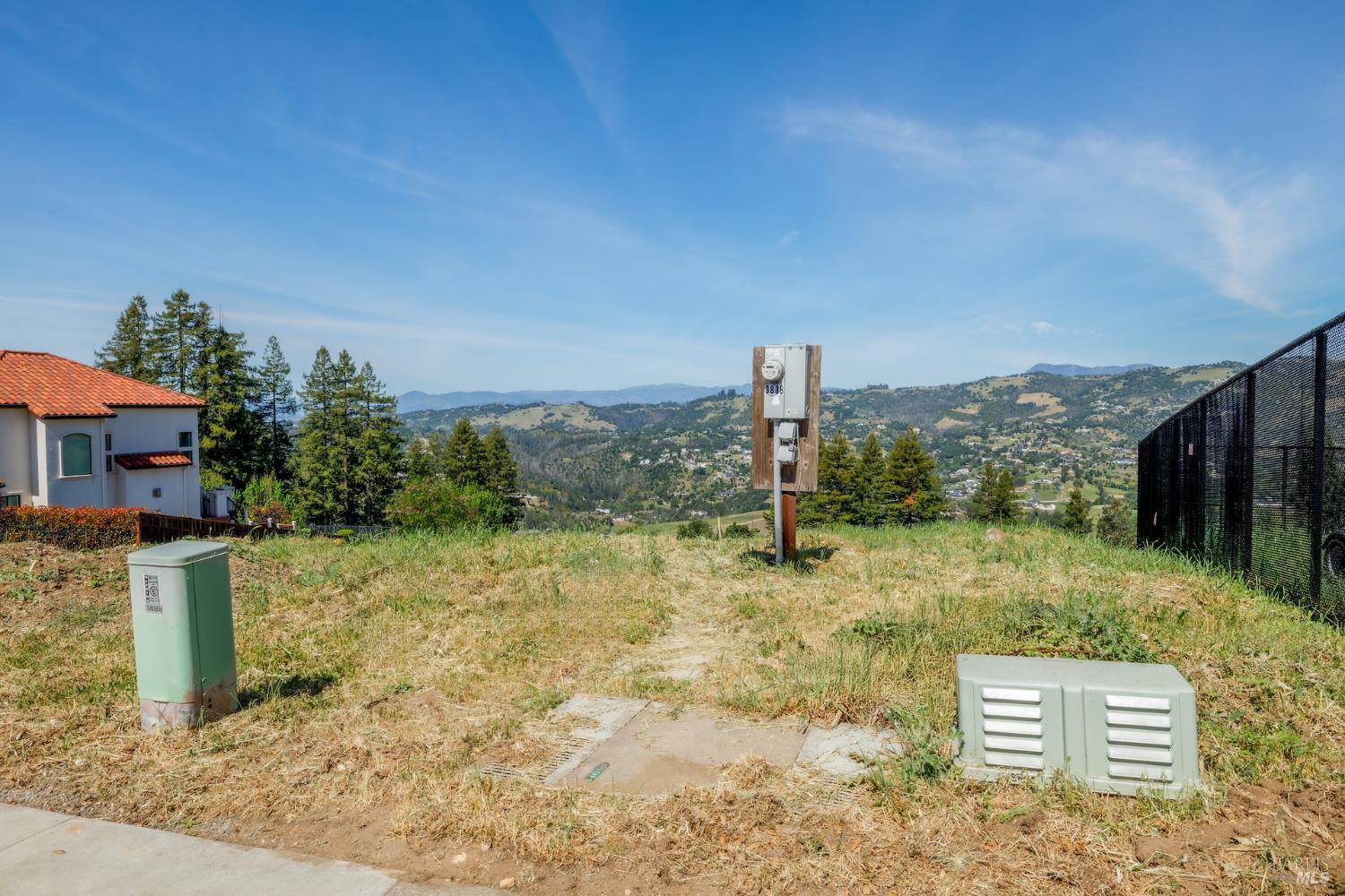 3888 Skyfarm Drive Santa Rosa, CA 95403 - Photo 14 of 18 a view of a garden with a building in the background