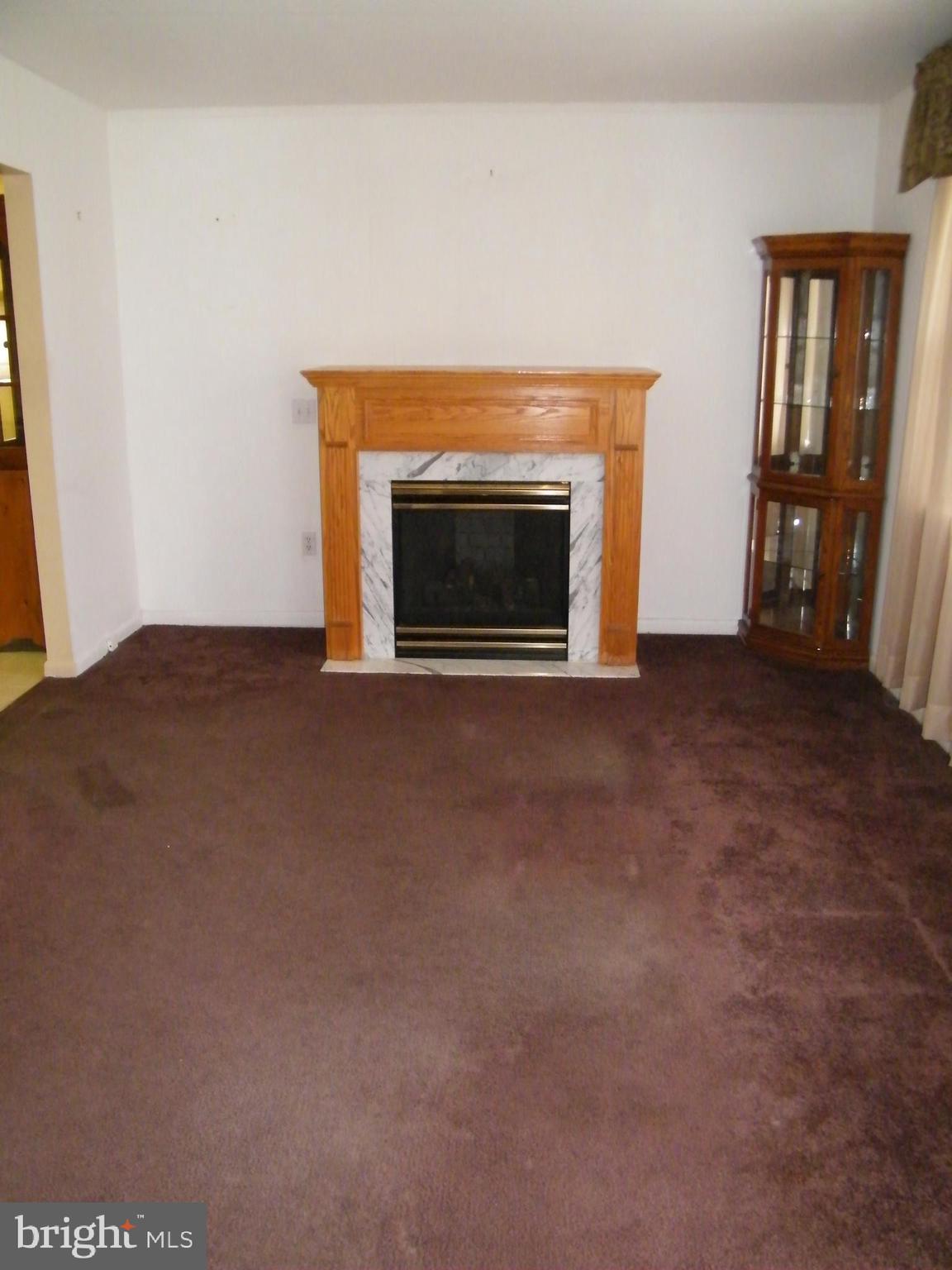 26 South Ritters Lane Owings Mills, MD 21117 - Photo 7 of 29 Livingroom (Wood floors under carpet)
