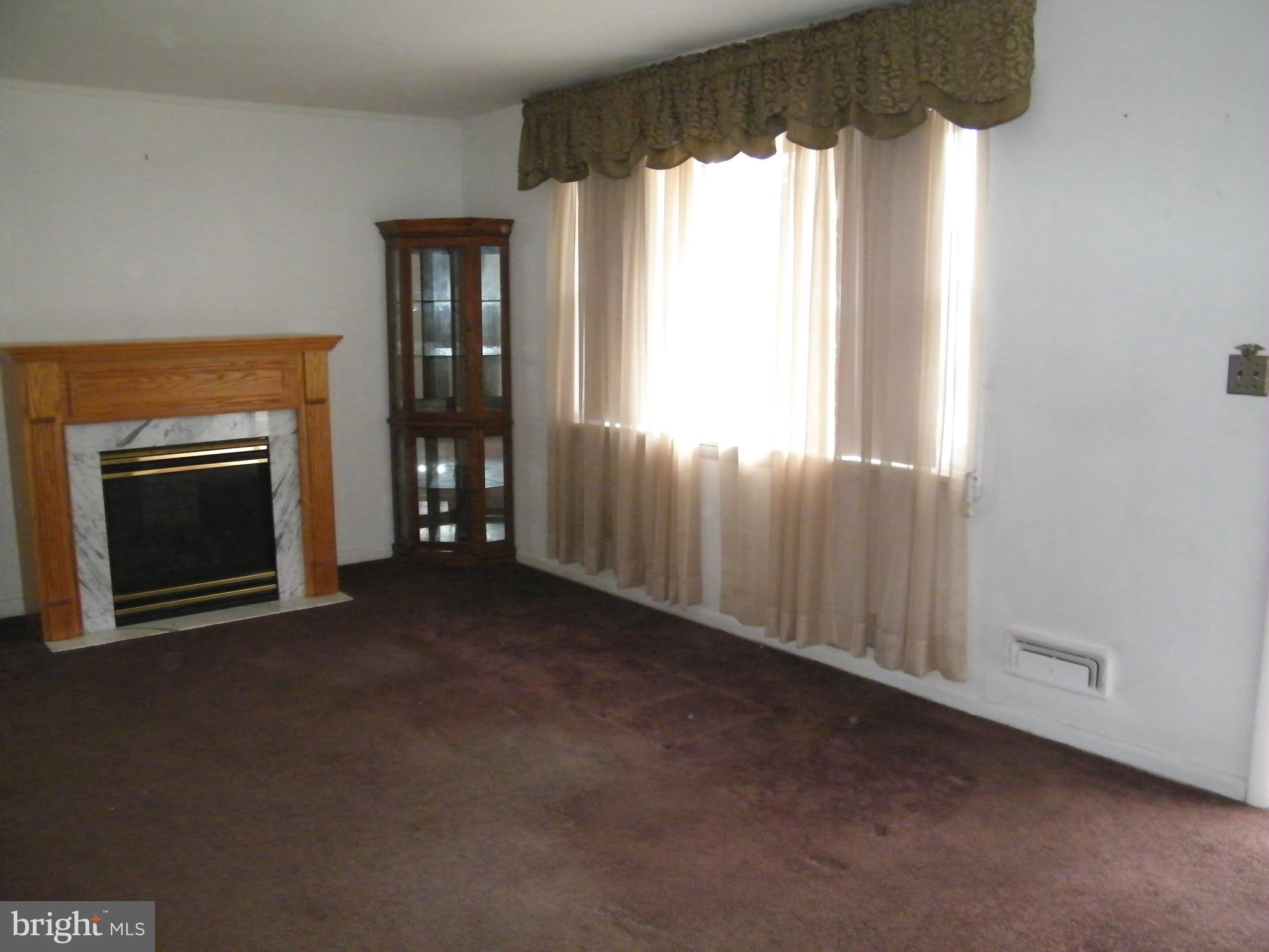 26 South Ritters Lane Owings Mills, MD 21117 - Photo 8 of 29 Livingroom (Wood floors under carpet)