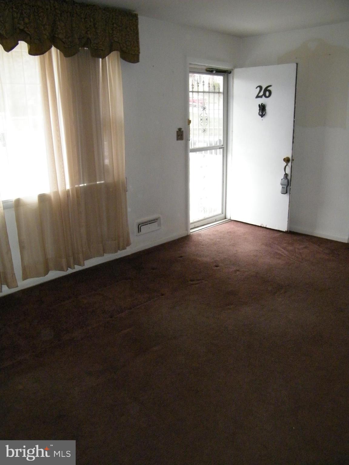 26 South Ritters Lane Owings Mills, MD 21117 - Photo 10 of 29 Livingroom (Wood floors under carpet)