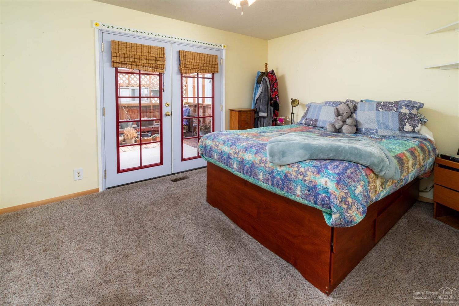 21452 Keyte Lane Bend, OR 97701 - Photo 21 of 25 Master bedroom with french doors to love