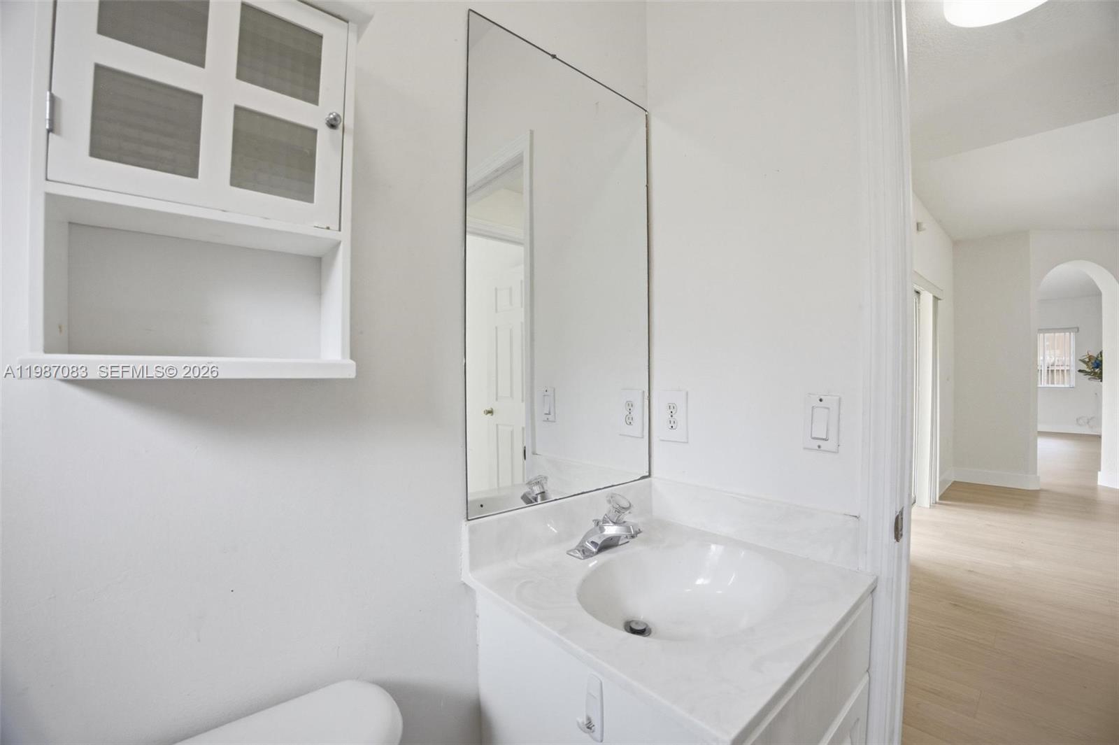 16131 Southwest 151st Terrace Miami, FL 33196 - Photo 28 of 55 a bathroom with a sink and a toilet