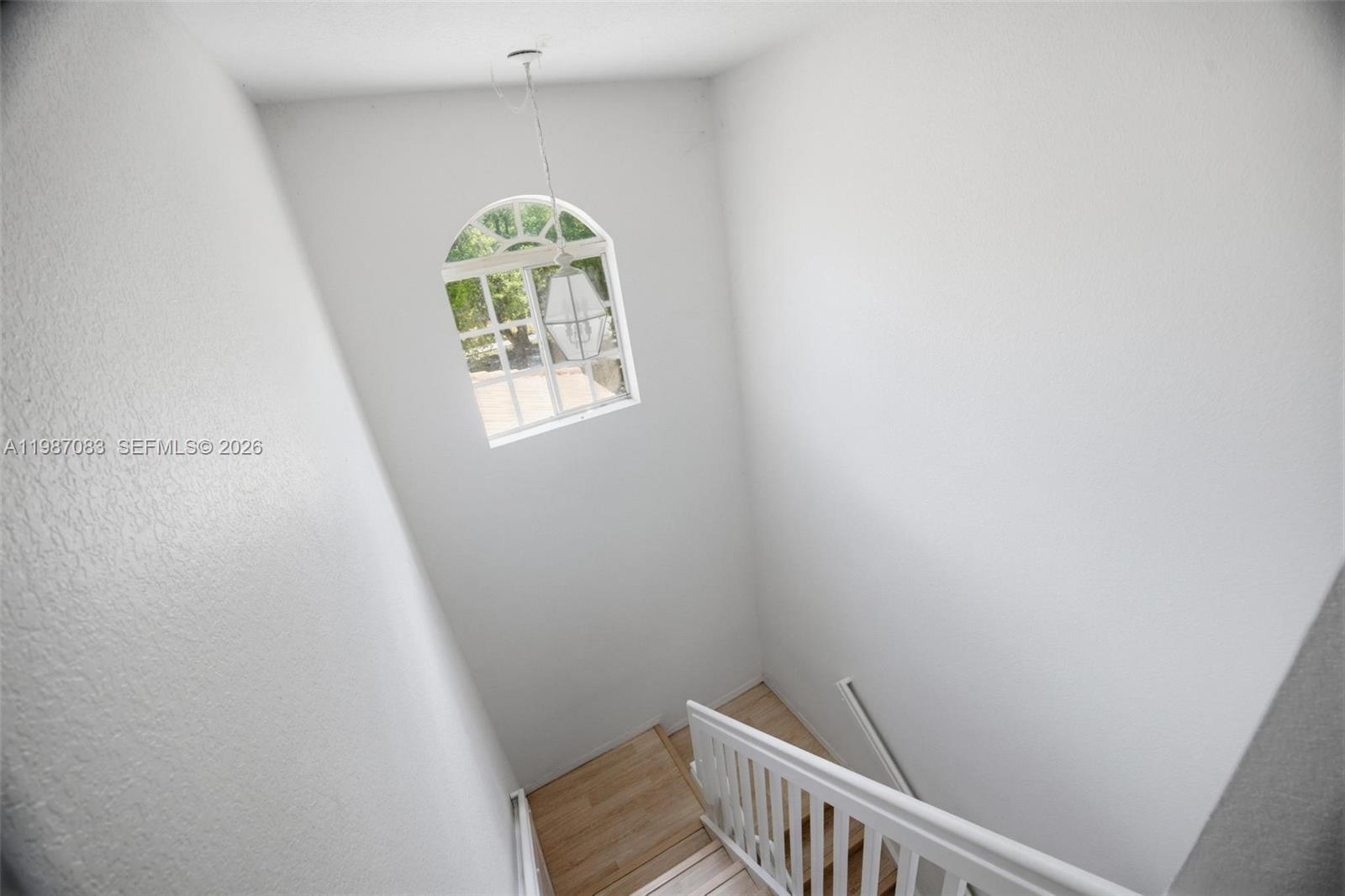 16131 Southwest 151st Terrace Miami, FL 33196 - Photo 31 of 55 a view of a hallway with window