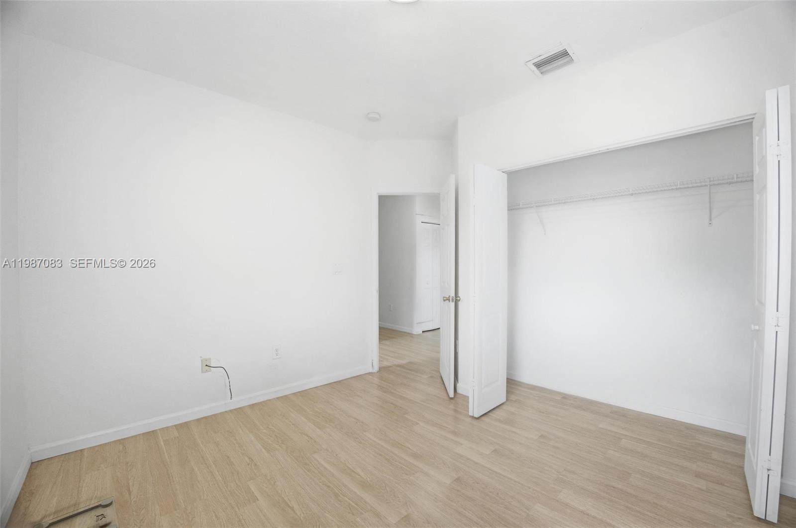 16131 Southwest 151st Terrace Miami, FL 33196 - Photo 33 of 55 a view of an empty room