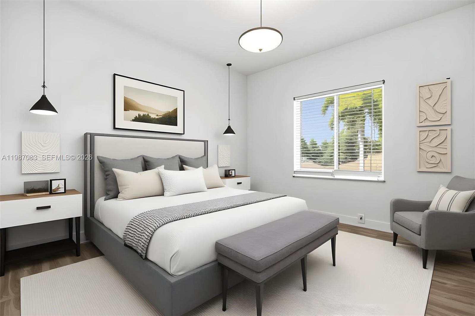 16131 Southwest 151st Terrace Miami, FL 33196 - Photo 49 of 55 a bedroom with bed and a couch