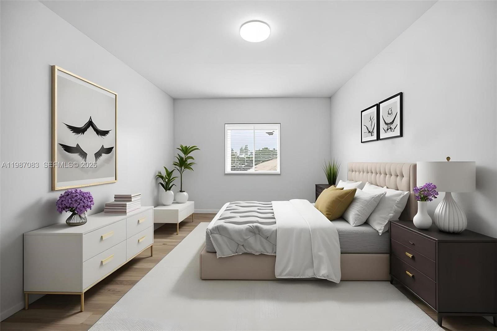 16131 Southwest 151st Terrace Miami, FL 33196 - Photo 50 of 55 a bedroom with bed and window