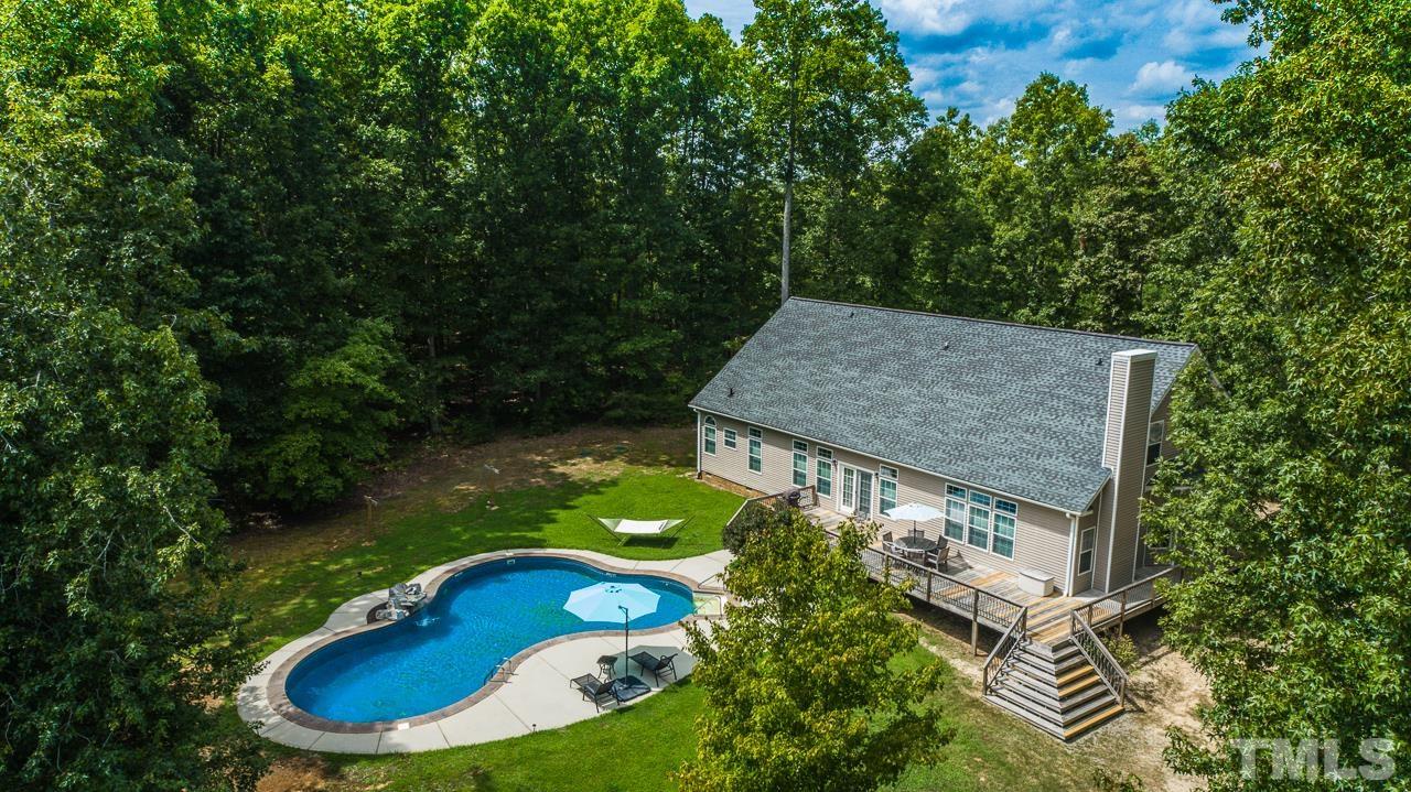 125 Adams Farm Road Roxboro, NC 27574 - Photo 1 of 30 an aerial view of a house having yard