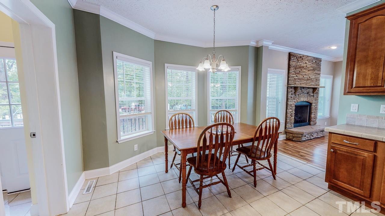 125 Adams Farm Road Roxboro, NC 27574 - Photo 13 of 30 a view of a dining room with furniture window and outside view