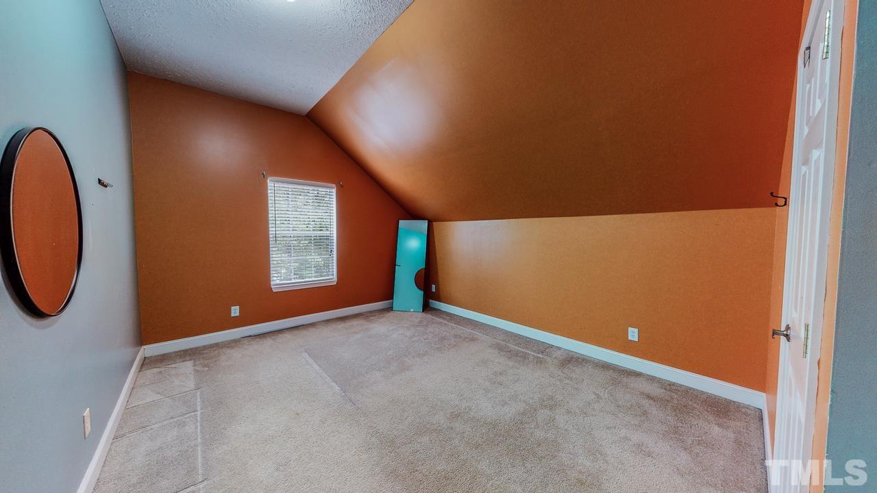 125 Adams Farm Road Roxboro, NC 27574 - Photo 26 of 30 an empty room with windows