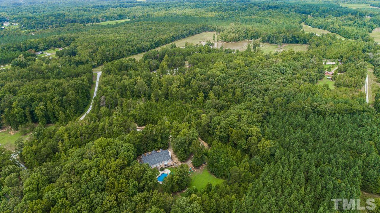 125 Adams Farm Road Roxboro, NC 27574 - Photo 28 of 30 a view of a lush green space