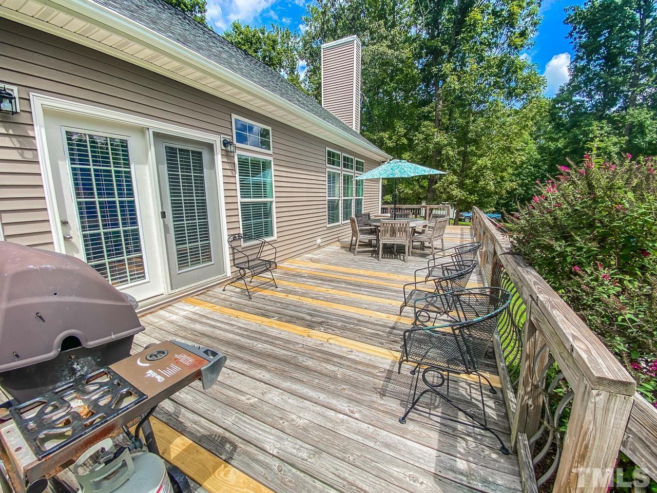 125 Adams Farm Road Roxboro, NC 27574 - Photo 30 of 30 a view of a patio on the deck