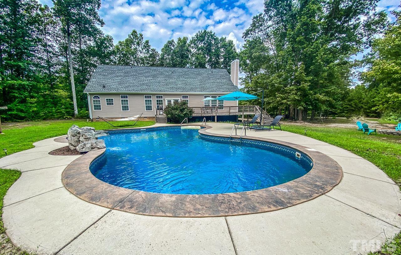 125 Adams Farm Road Roxboro, NC 27574 - Photo 8 of 30 a view of a house with swimming pool