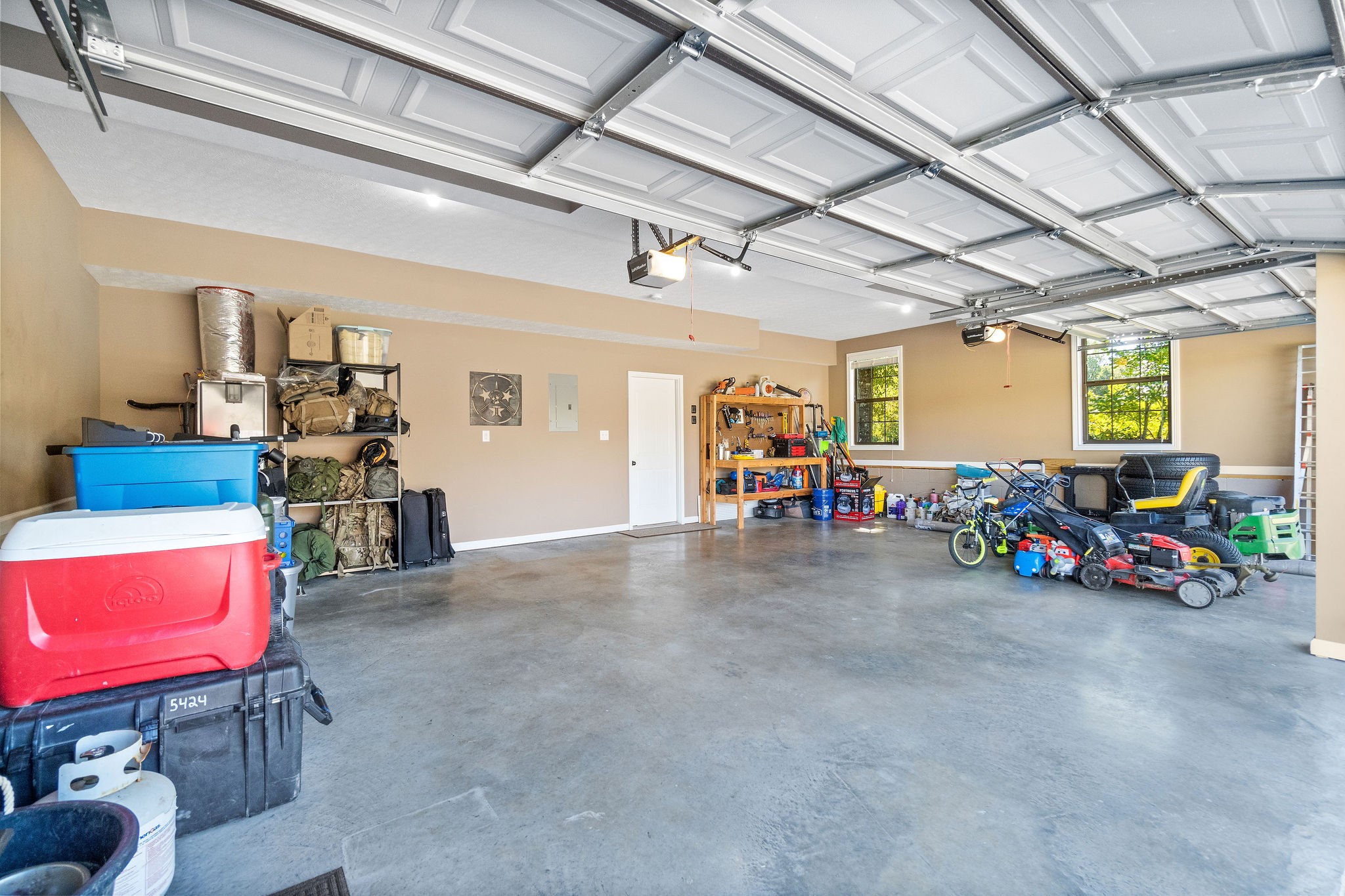 5073 Trough Springs Road Adams, TN 37010 - Photo 44 of 45 a view of a garage with a table and chairs