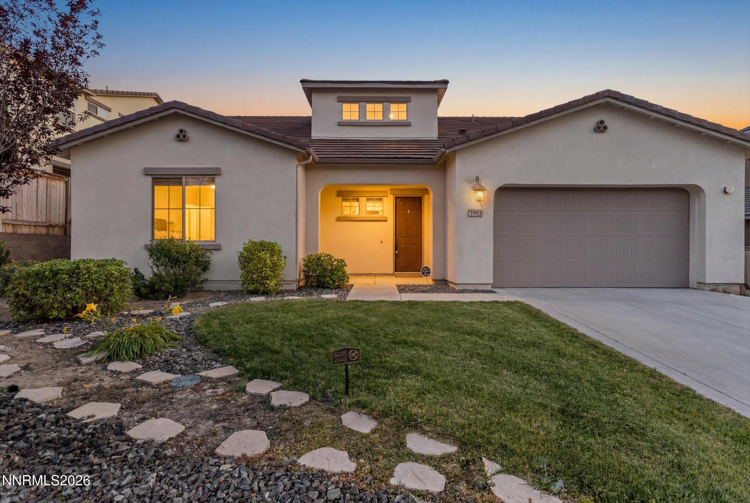 1725 Verdi Vista Court Reno, NV 89523 - Photo 2 of 37 a view of a house with backyard and garden