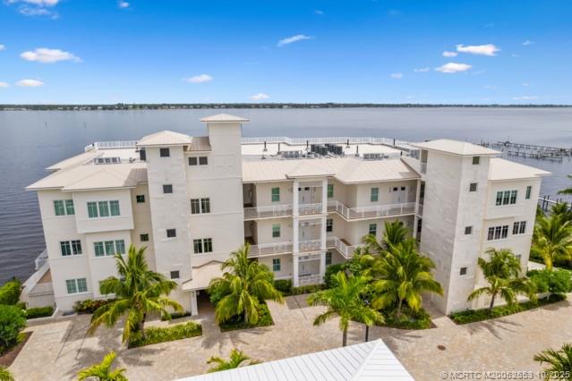 51 Southeast Seminole Street, Unit 305 Stuart, FL 34994 - Photo 3 of 47 a front view of a multi story building