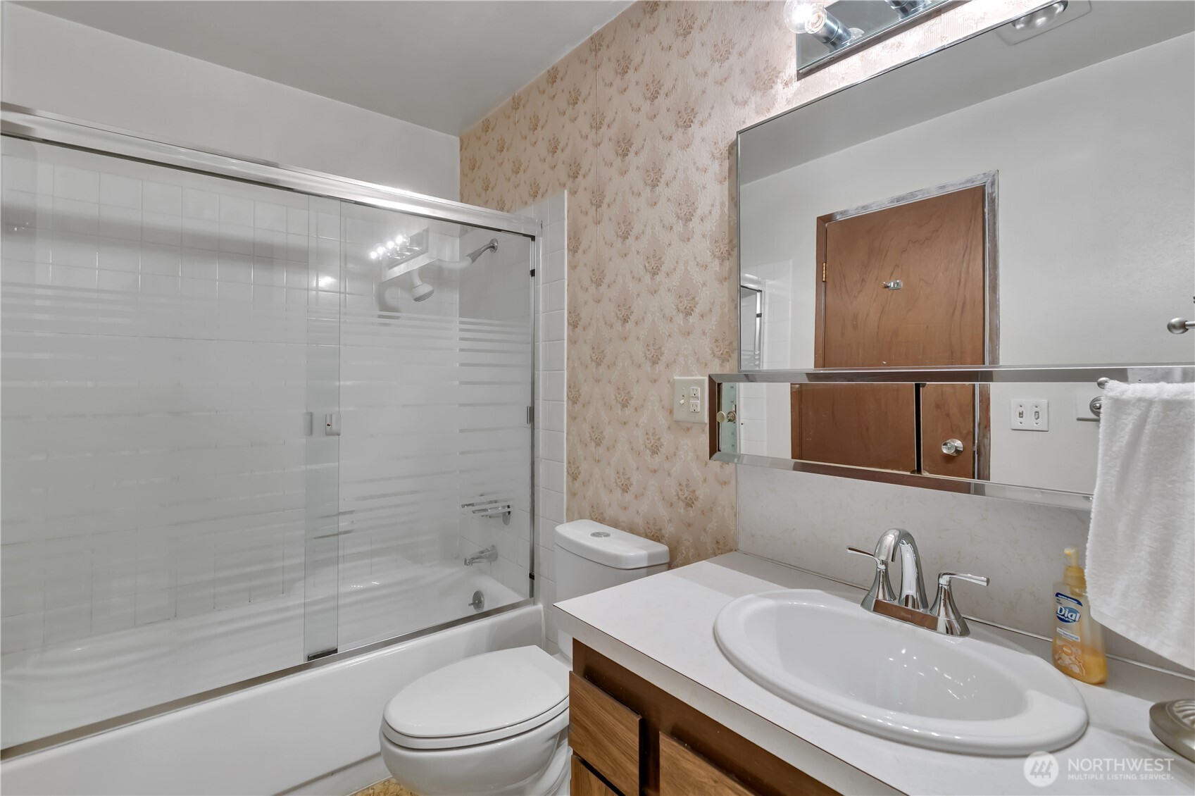 412 213th Place Southwest, Unit 21D Bothell, WA 98021 - Photo 21 of 28 a bathroom with a sink toilet and shower
