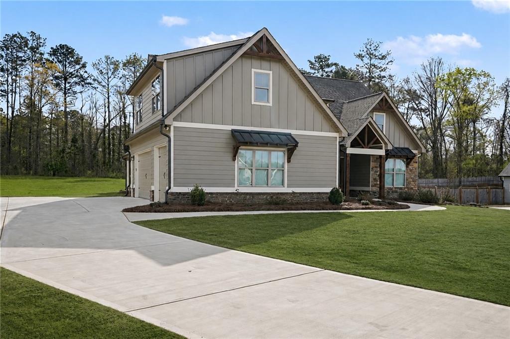 287 Conner Lane Williamson, GA 30292 - Photo 3 of 33 a front view of a house with a yard
