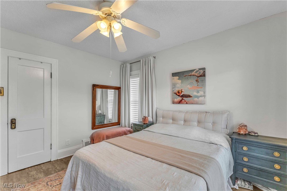 3242 Cedarbrook Road Cleveland, OH 44118 - Photo 18 of 24 Bedroom with wood finished floors and a ceiling fan