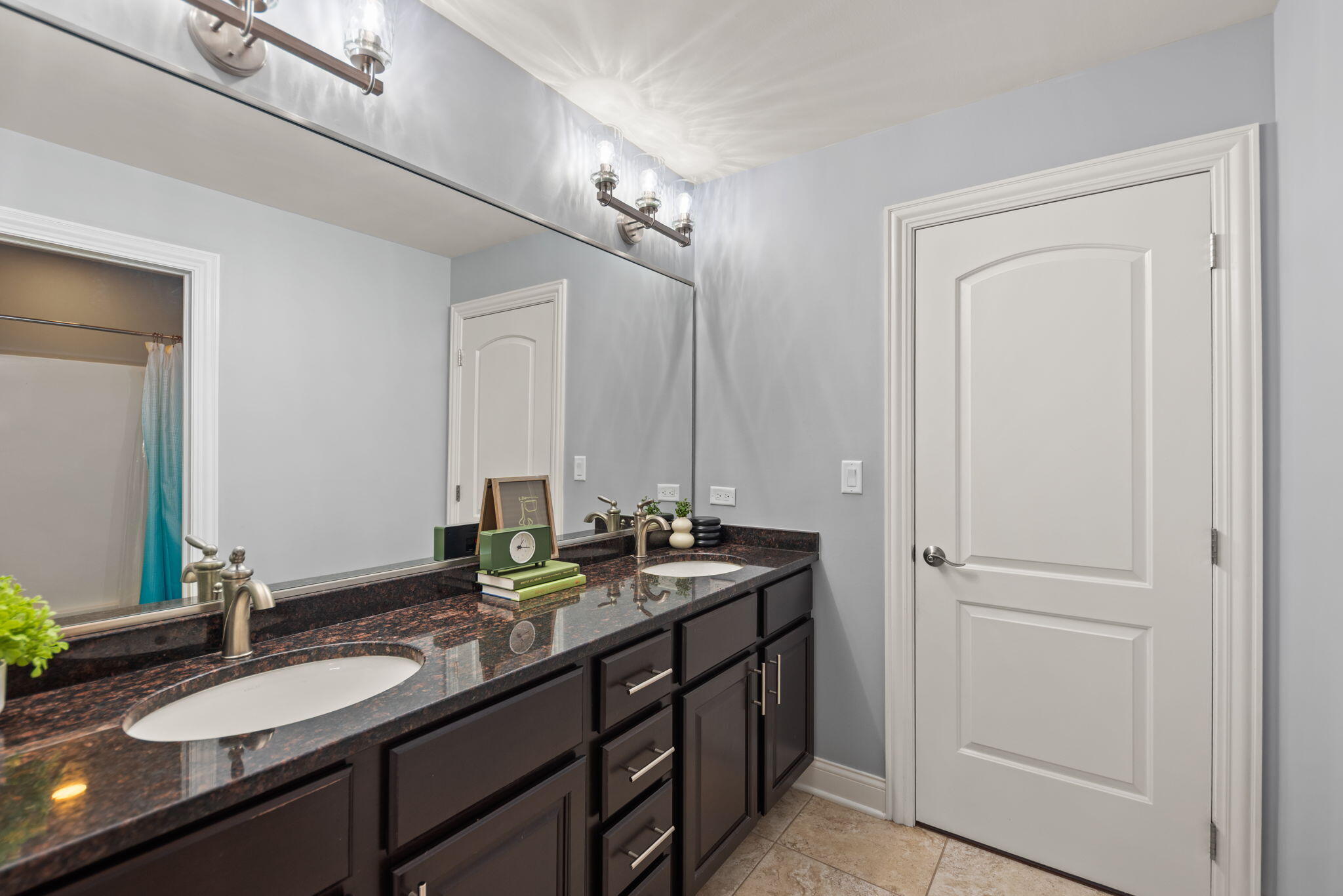 9080 Winding Trail St. John, IN 46373 - Photo 24 of 34 a bathroom with double sink and a mirror