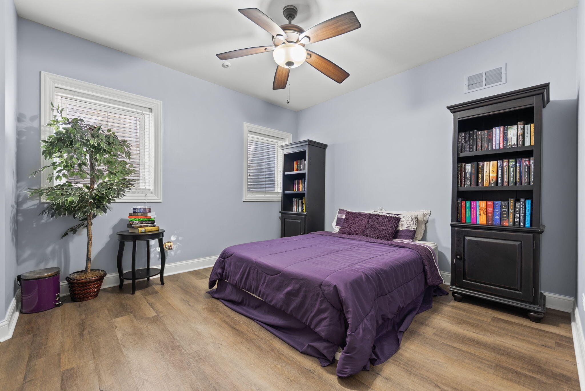 9080 Winding Trail St. John, IN 46373 - Photo 28 of 34 a bedroom with a bed and a chandelier