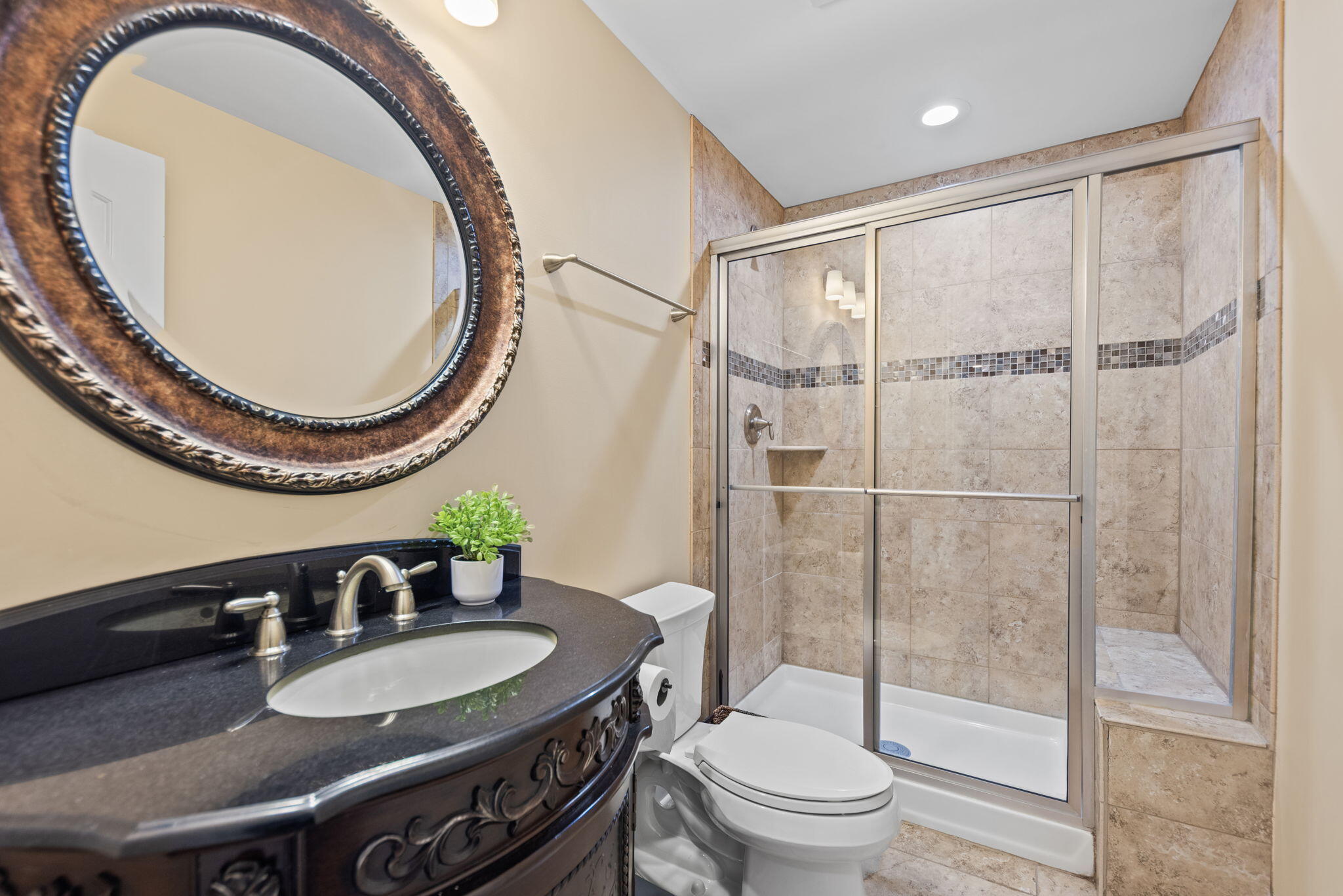 9080 Winding Trail St. John, IN 46373 - Photo 29 of 34 a bathroom with a sink a toilet and a mirror