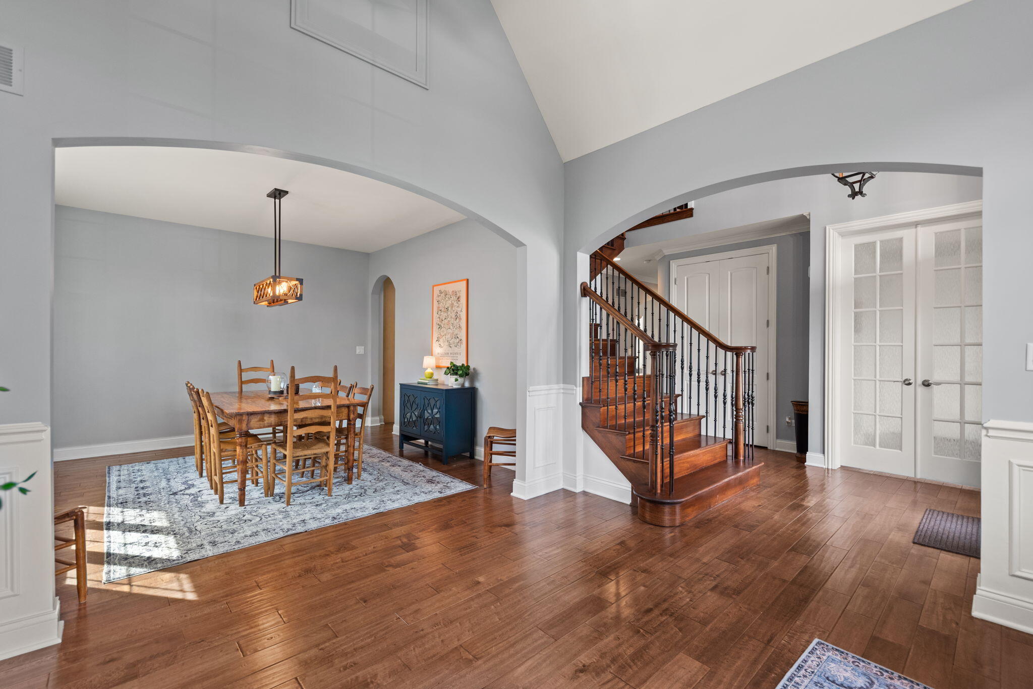 9080 Winding Trail St. John, IN 46373 - Photo 5 of 34 a dining room with wooden floor table and chairs